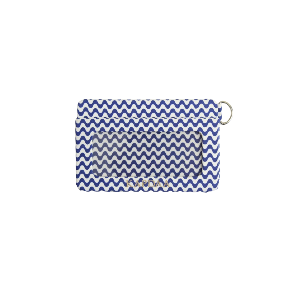white and blue wallet with golden work